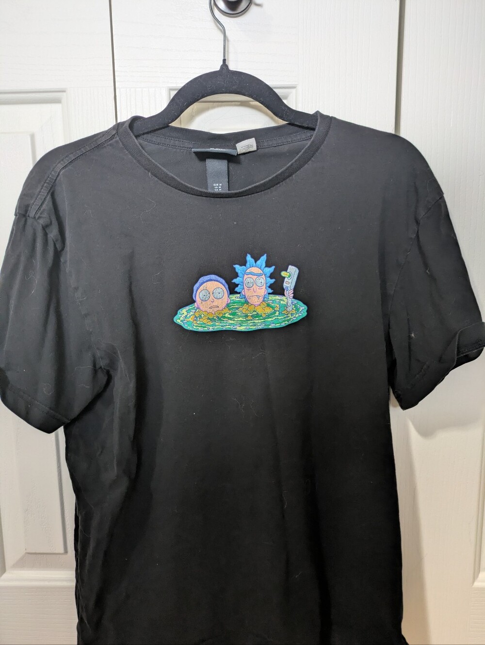 H&M Black Short Sleeve Tee with Colorful Rick & Morty Graphic